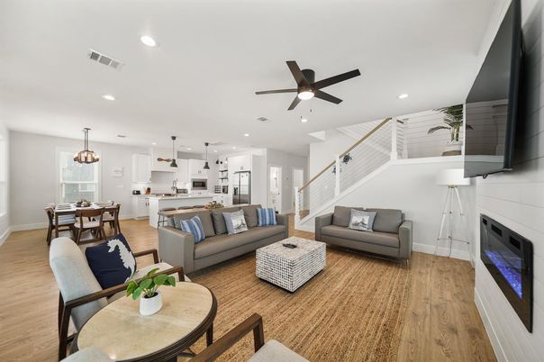 Dining room, Fireplace, Interior, Kitchen, Living room, Pendant Lights, Recessed Lighting, Stainless Steel Appliances, Wood Texture Flooring