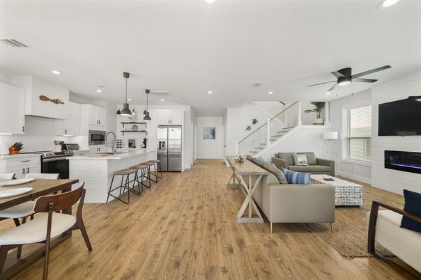 Dining room, Fireplace, Interior, Kitchen, Living room, Pendant Lights, Recessed Lighting, Stainless Steel Appliances, Wood Texture Flooring