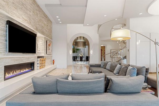 Fireplace, Interior, Living room, Recessed Lighting, Stone Walls, Wood Texture Flooring