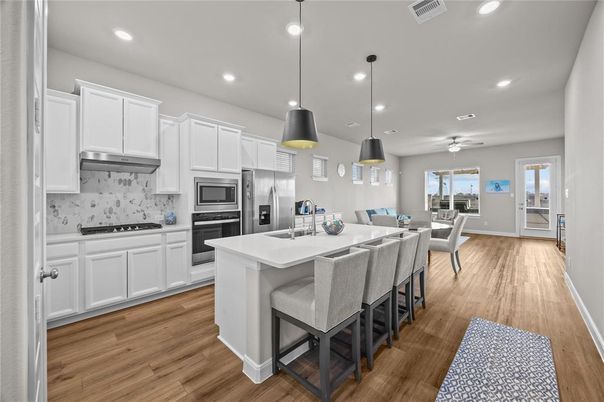 Dining room, Interior, Kitchen, Pendant Lights, Recessed Lighting, Stainless Steel Appliances, Wood Texture Flooring