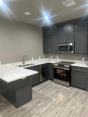 Interior, Kitchen, Recessed Lighting, Stainless Steel Appliances, Wood Texture Flooring