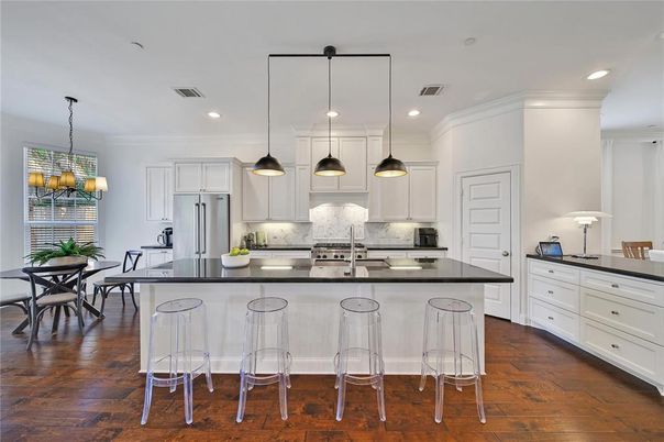 Dining room, Interior, Kitchen, Pendant Lights, Recessed Lighting, Stainless Steel Appliances, Wood Texture Flooring