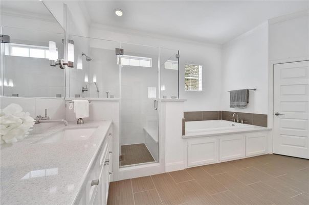 Bathroom, Dual Sink Vanities, Glass Shower, Interior, Recessed Lighting, Wood Texture Flooring