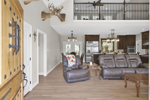 Dining room, Interior, Kitchen, Living room, Pendant Lights, Recessed Lighting, Stainless Steel Appliances, Wood Texture Flooring
