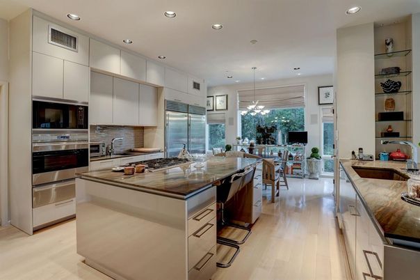 Dining room, Interior, Kitchen, Pendant Lights, Recessed Lighting, Stainless Steel Appliances, Wood Texture Flooring