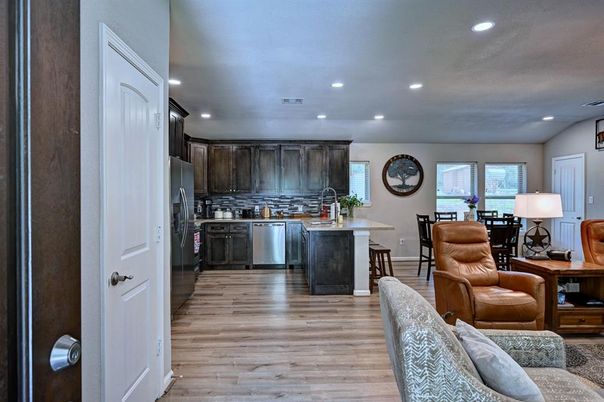 Dining room, Interior, Kitchen, Recessed Lighting, Stainless Steel Appliances, Wood Texture Flooring