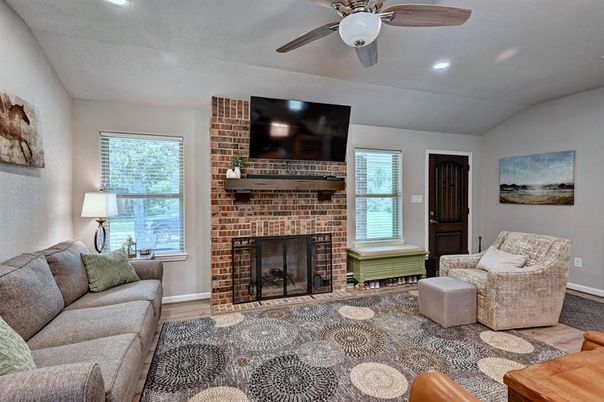 Fireplace, Interior, Living room, Recessed Lighting, Stone Walls, Wood Texture Flooring