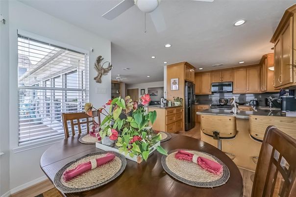 Dining room, Interior, Kitchen, Recessed Lighting, Stainless Steel Appliances, Wood Texture Flooring