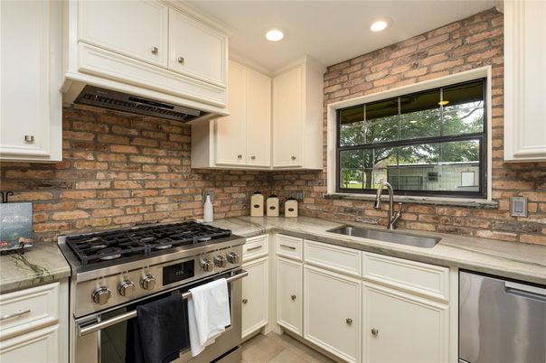 Interior, Kitchen, Recessed Lighting, Stainless Steel Appliances, Stone Walls