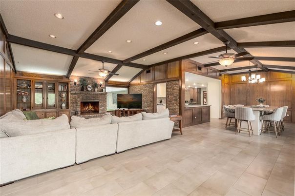 Dining room, Fireplace, Interior, Living room, Recessed Lighting, Stone Walls, Wooden Beams