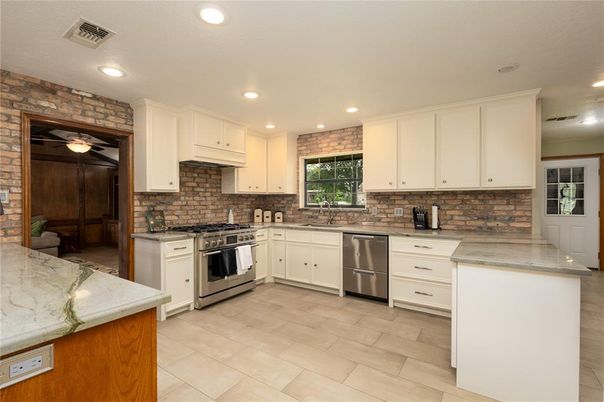 Interior, Kitchen, Recessed Lighting, Stainless Steel Appliances, Stone Walls