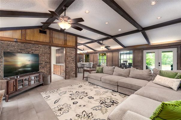 Dining room, Interior, Living room, Recessed Lighting, Stone Walls, Wooden Beams