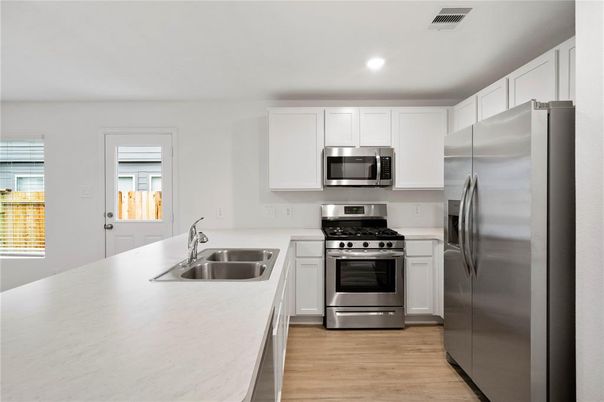 Interior, Kitchen, Recessed Lighting, Stainless Steel Appliances, Wood Texture Flooring