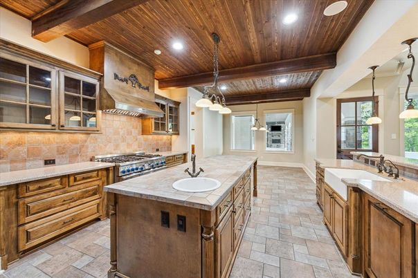Interior, Kitchen, Pendant Lights, Recessed Lighting, Stainless Steel Appliances, Tile Countertops, Wooden Beams, Wooden Ceilings