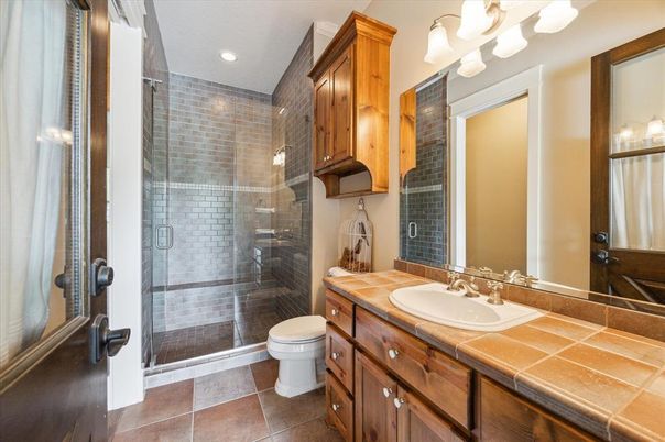 Bathroom, Glass Shower, Interior, Recessed Lighting, Tile Countertops