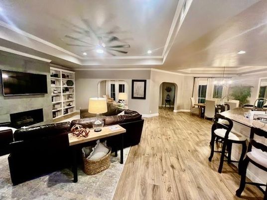 Dining room, Fireplace, Interior, Living room, Recessed Lighting, Wood Texture Flooring