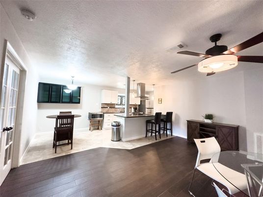 Dining room, Interior, Kitchen, Pendant Lights, Stainless Steel Appliances, Wood Texture Flooring