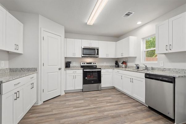 Interior, Kitchen, Recessed Lighting, Stainless Steel Appliances, Wood Texture Flooring