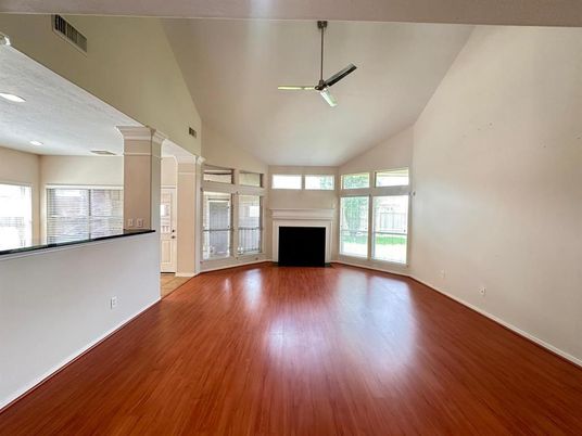 Empty room, Fireplace, Interior, Recessed Lighting, Wood Texture Flooring
