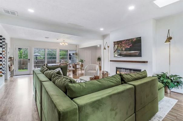 Chandelier, Dining room, Fireplace, Interior, Living room, Recessed Lighting, Wood Texture Flooring