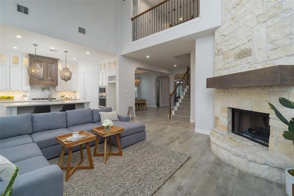 Fireplace, Interior, Kitchen, Living room, Pendant Lights, Recessed Lighting, Stone Walls, Wood Texture Flooring