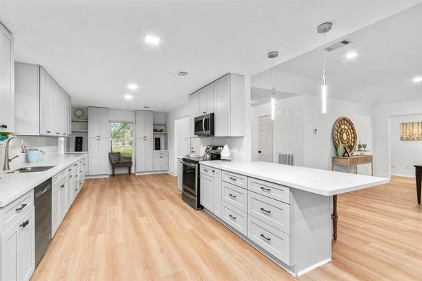 Interior, Kitchen, Pendant Lights, Recessed Lighting, Stainless Steel Appliances, Wood Texture Flooring