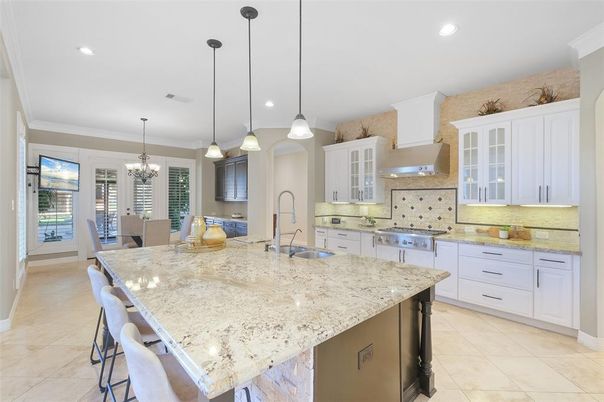 Chandelier, Dining room, Interior, Kitchen, Pendant Lights, Recessed Lighting, Stainless Steel Appliances