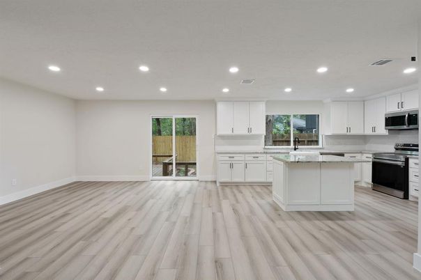 Interior, Kitchen, Recessed Lighting, Stainless Steel Appliances, Wood Texture Flooring