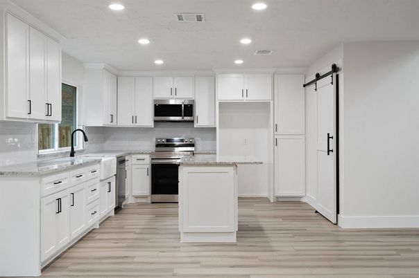 Interior, Kitchen, Recessed Lighting, Stainless Steel Appliances, Wood Texture Flooring