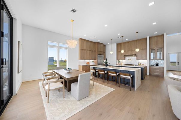 Chandelier, Dining room, Interior, Kitchen, Pendant Lights, Recessed Lighting, Stainless Steel Appliances, Wood Texture Flooring