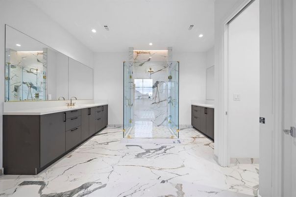 Bathroom, Dual Sink Vanities, Glass Shower, Interior, Marble, Marble Walls, Recessed Lighting