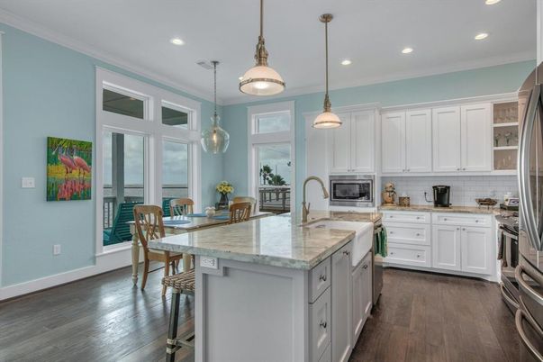 Dining room, Interior, Kitchen, Pendant Lights, Recessed Lighting, Stainless Steel Appliances, Wood Texture Flooring