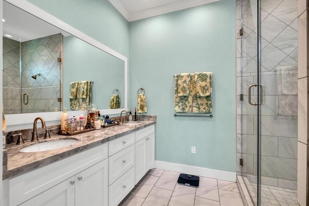 Bathroom, Dual Sink Vanities, Glass Shower, Interior, Marble, Recessed Lighting