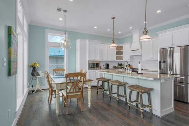 Dining room, Interior, Kitchen, Pendant Lights, Recessed Lighting, Stainless Steel Appliances, Wood Texture Flooring