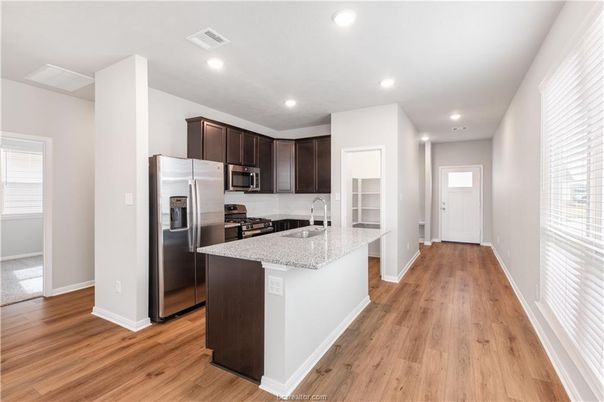 Interior, Kitchen, Recessed Lighting, Stainless Steel Appliances, Wood Texture Flooring