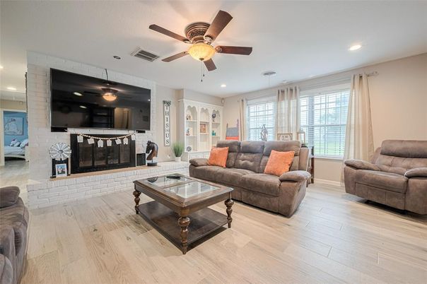 Fireplace, Interior, Living room, Recessed Lighting, Wood Texture Flooring