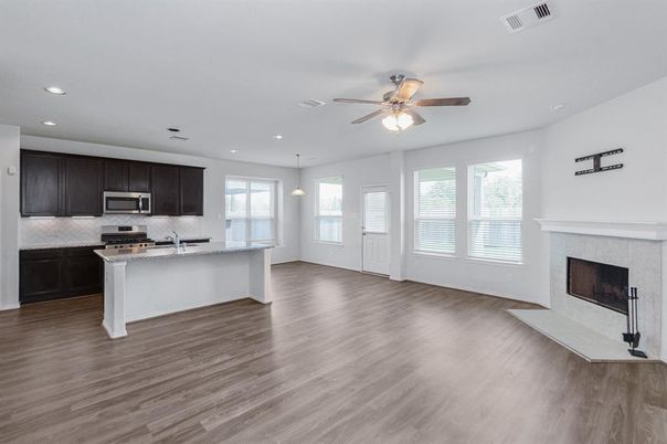 Fireplace, Interior, Kitchen, Pendant Lights, Recessed Lighting, Stainless Steel Appliances, Wood Texture Flooring