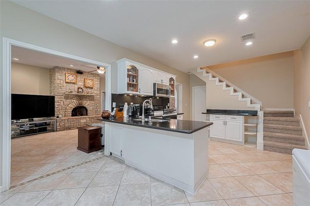 Fireplace, Interior, Kitchen, Recessed Lighting, Stone Walls