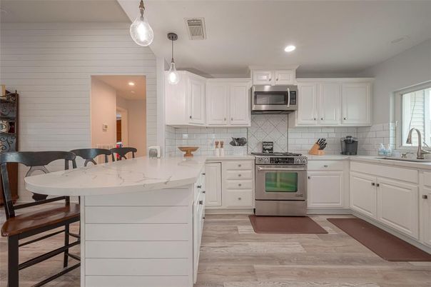 Interior, Kitchen, Pendant Lights, Recessed Lighting, Stainless Steel Appliances, Wood Texture Flooring