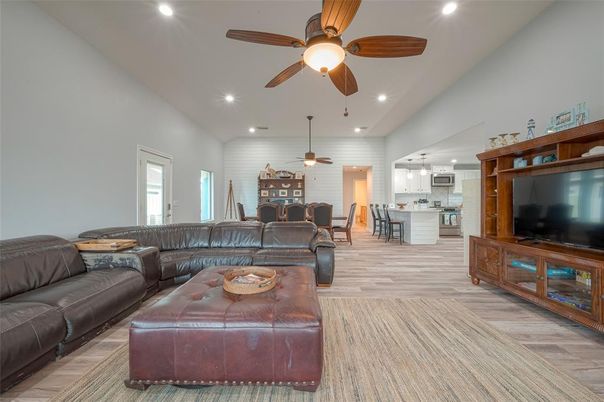 Dining room, Interior, Kitchen, Living room, Recessed Lighting, Stainless Steel Appliances, Wood Texture Flooring