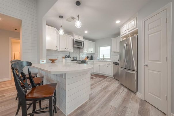 Interior, Kitchen, Pendant Lights, Recessed Lighting, Stainless Steel Appliances, Wood Texture Flooring