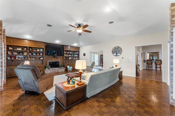 Fireplace, Interior, Living room, Recessed Lighting, Stone Walls, Wood Texture Flooring