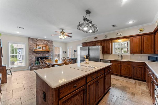 Dining room, Fireplace, Interior, Kitchen, Recessed Lighting, Stainless Steel Appliances, Stone Walls