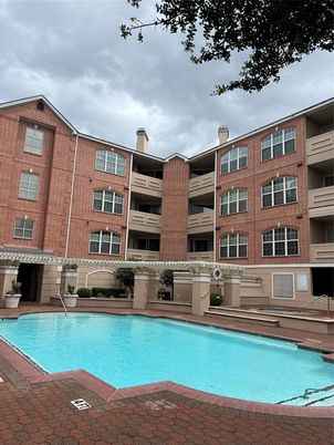 Exterior, Facade, Brick Facade, Pool, Condo Building