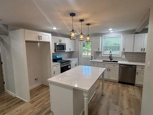 Interior, Kitchen, Pendant Lights, Recessed Lighting, Stainless Steel Appliances, Wood Texture Flooring
