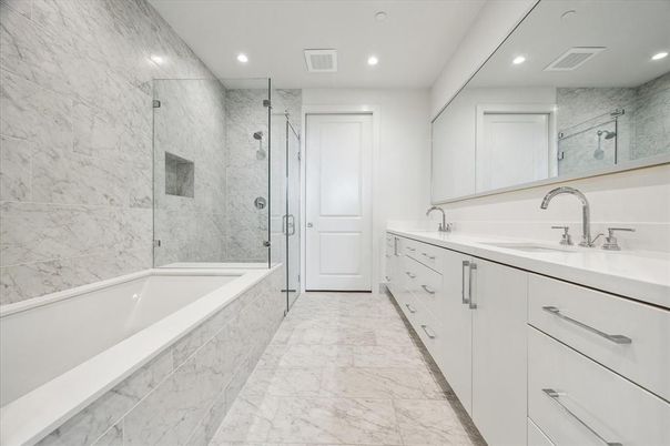 Bathroom, Dual Sink Vanities, Glass Shower, Interior, Marble, Marble Walls, Recessed Lighting