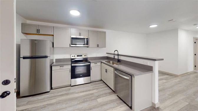 Interior, Kitchen, Recessed Lighting, Stainless Steel Appliances, Wood Texture Flooring