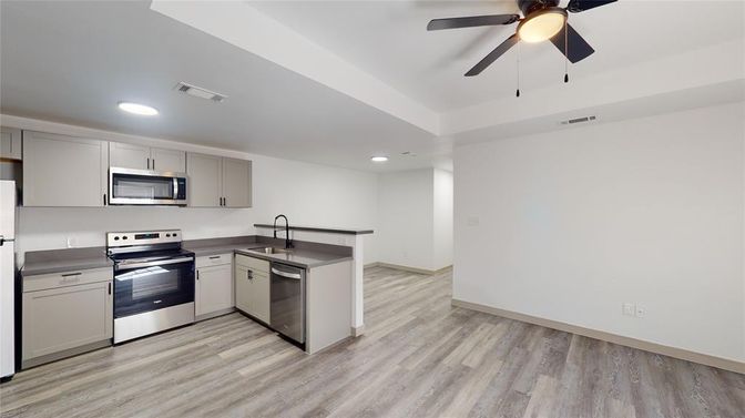 Interior, Kitchen, Recessed Lighting, Stainless Steel Appliances, Wood Texture Flooring