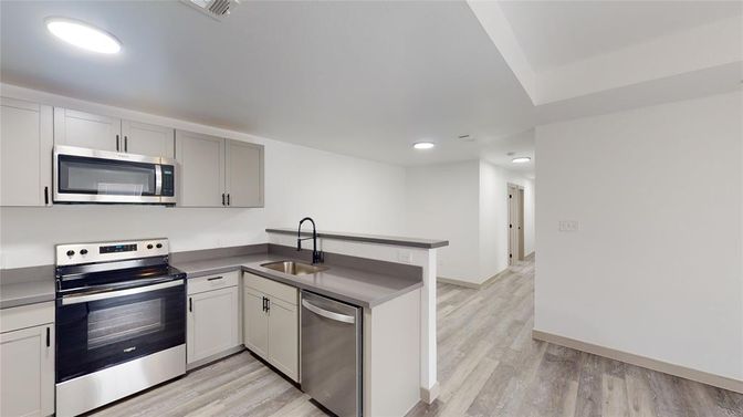 Interior, Kitchen, Recessed Lighting, Stainless Steel Appliances, Wood Texture Flooring