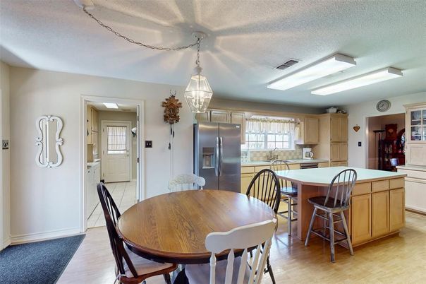 Dining room, Interior, Kitchen, Pendant Lights, Stainless Steel Appliances, Wood Texture Flooring